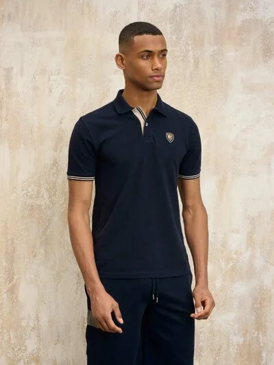 POLO CON LOGOTIPO OAKLAND