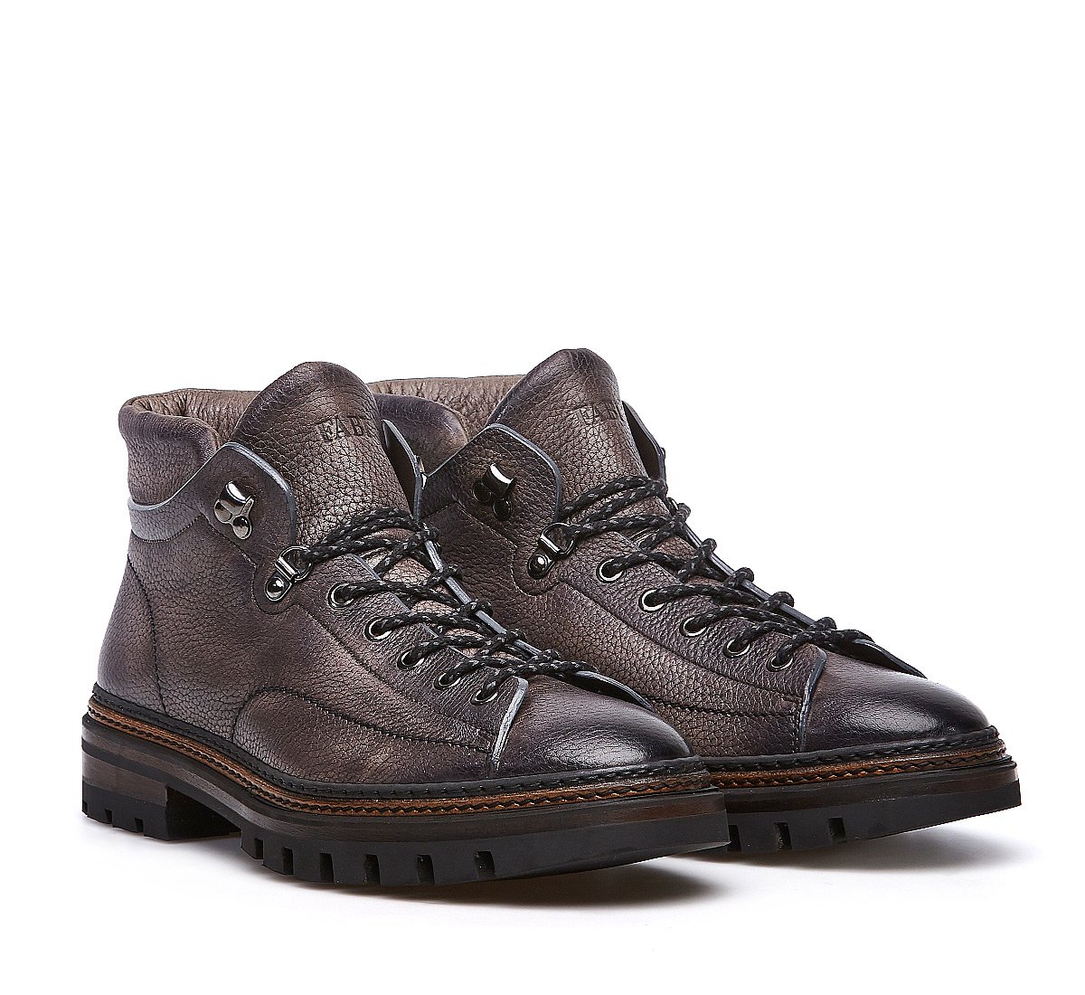 Buckskin ankle boots with delicate visible stitching tinted on tint