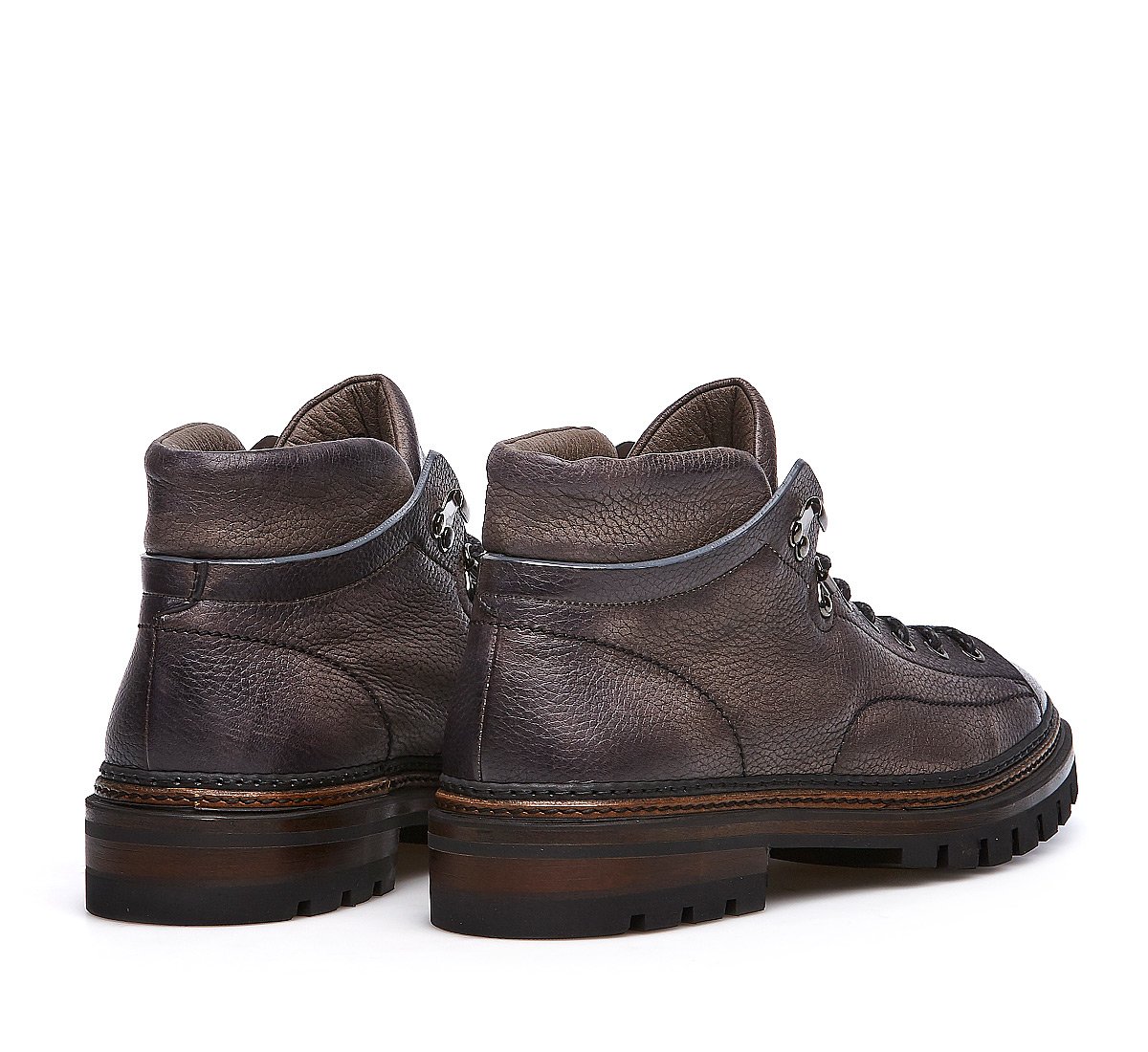 Buckskin ankle boots with delicate visible stitching tinted on tint