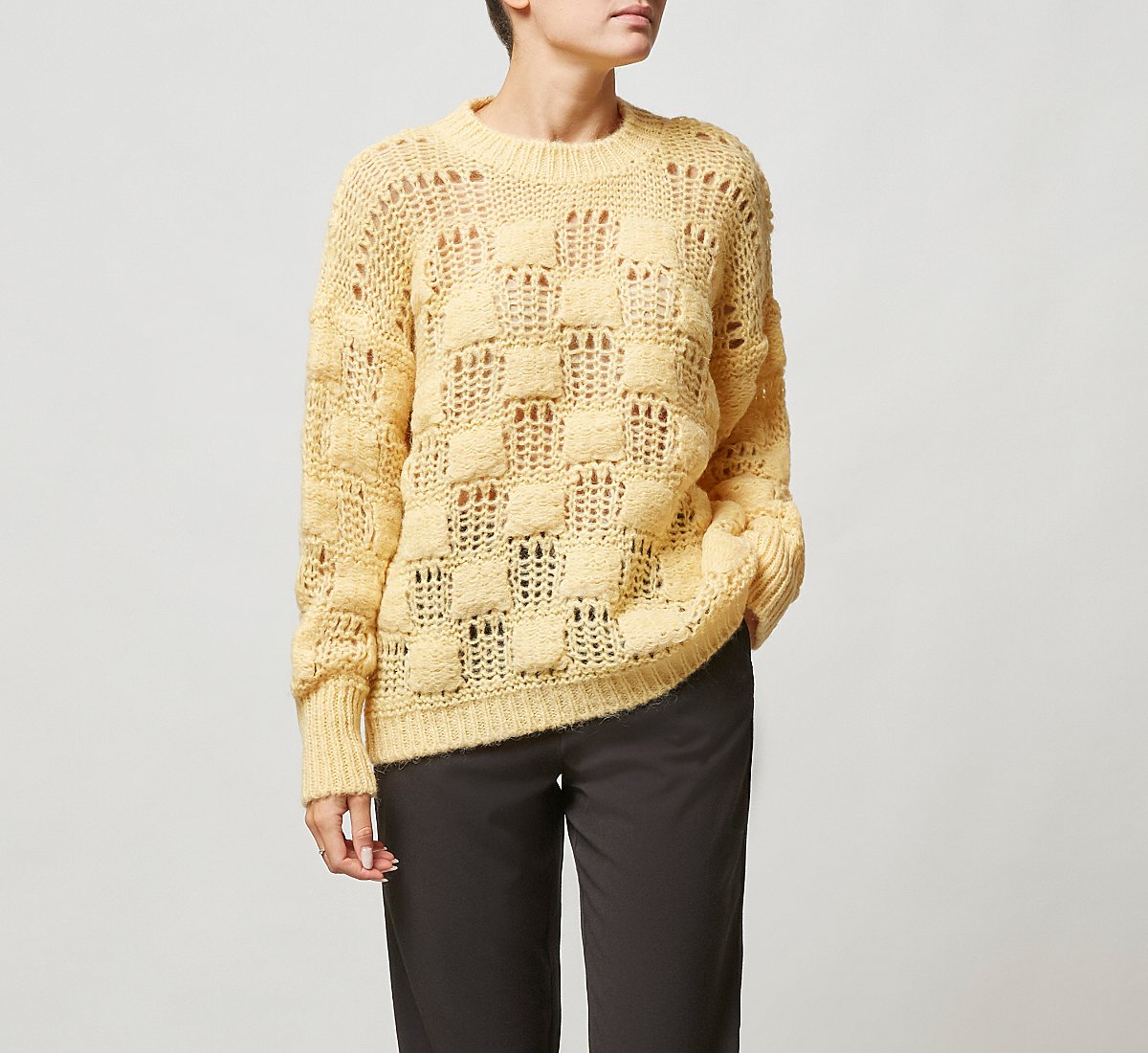 Sweater with openwork