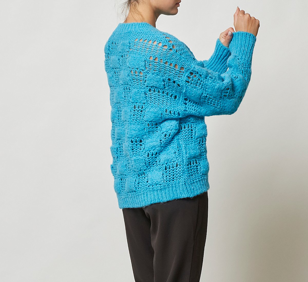 Sweater with openwork