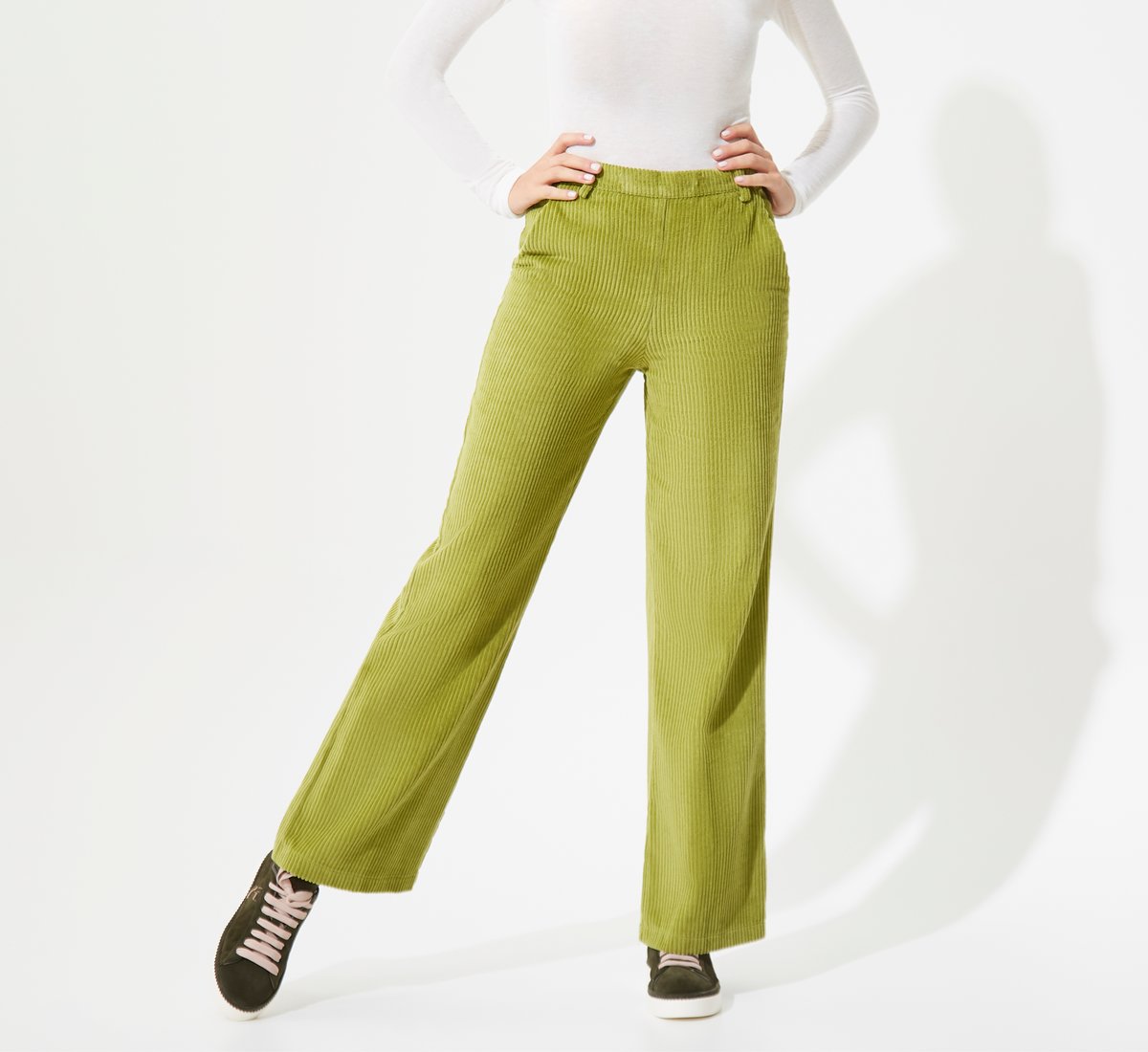 Green ribbed velour trousers
