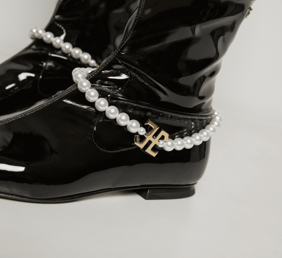 Fabi ankle boot in patent leather with pearl decoration