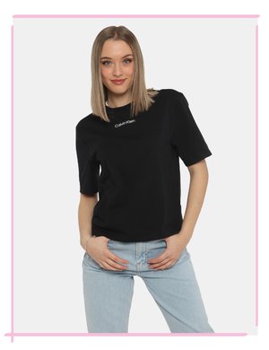 T-shirt da donna scontata - T-shirt  Calvin Klein Nero