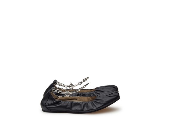 Black ballerina flats with anklet