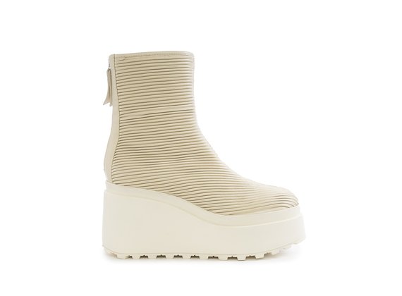Bone-white ribbed ankle boots with wedge