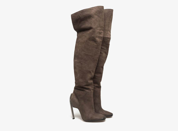 Thigh high boot with ponyskin flap