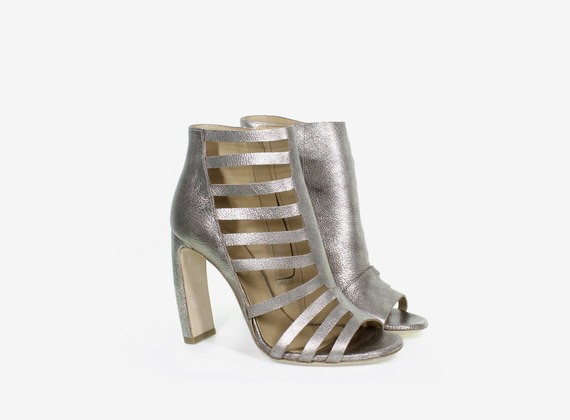 Open asymmetric ankle boot with internal zip - Gold