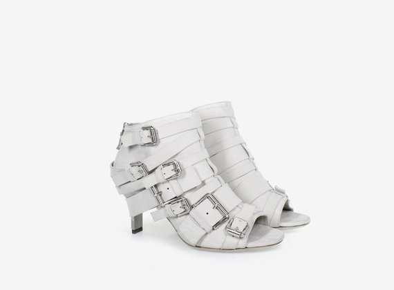 Multi-buckle open heel low ankle boot, crafted from nubuck with steel heel - White