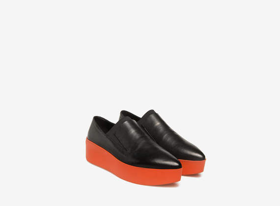 Black on orange slippers