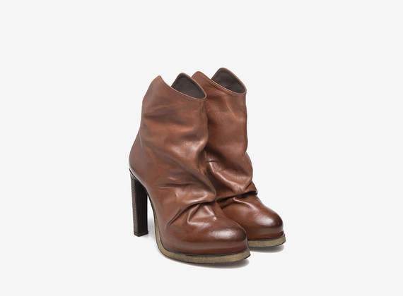 Pleated leather cowboy ankle boots