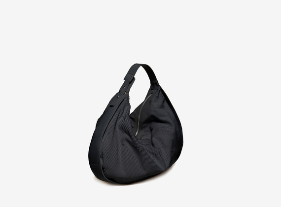 Black engraved crescent-shaped duffel bag