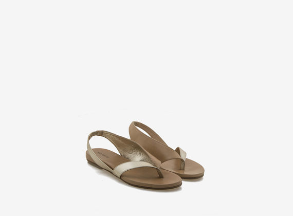 Asymmetrical flip-flop sandal in laminated leather - Laminated Platinum / Brown