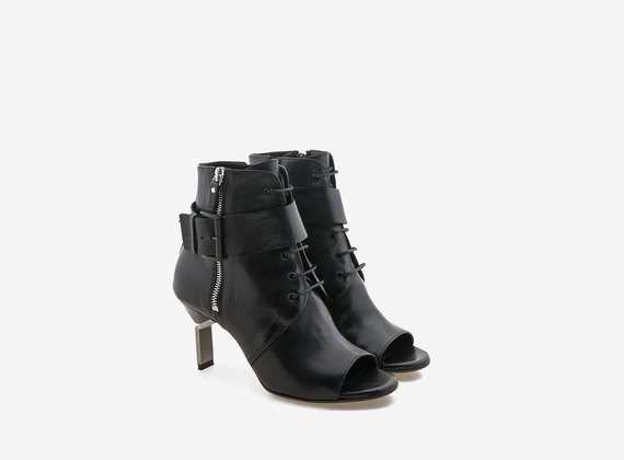 Lace-up ankle boot with fastening and steel heel