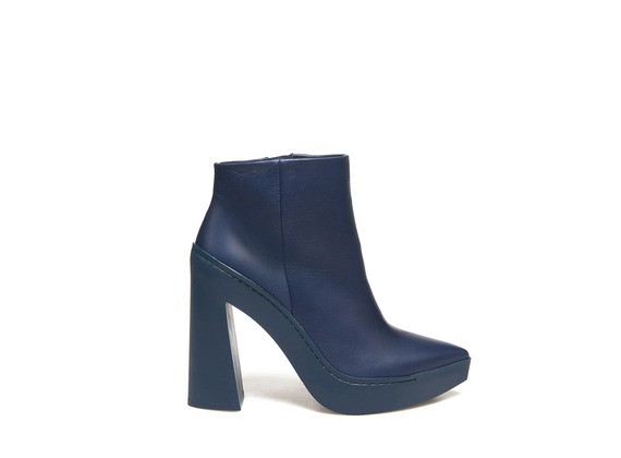 High-heeled blue ankle boots with rubber flared heel