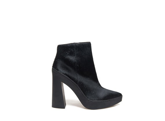 Ankle boot with pony skin effect and flared rubber heel