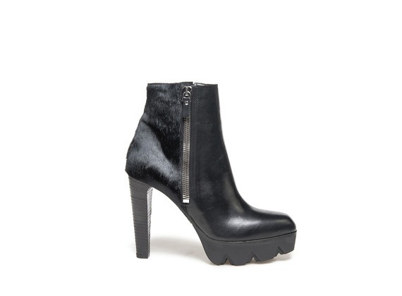 Ankle boots with pony skin effect back and lug platform