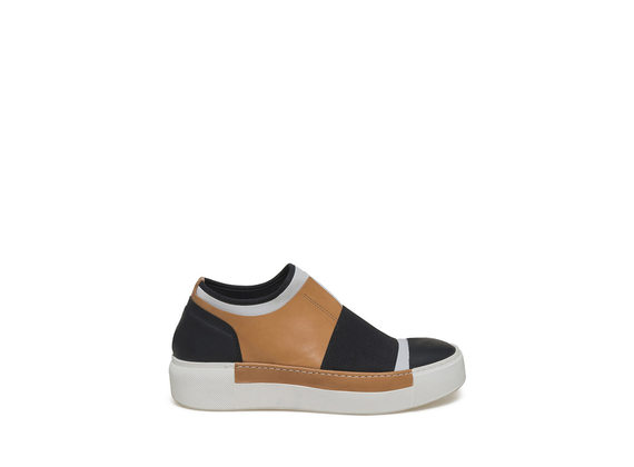 White neoprene slip-on with cowhide patched piece