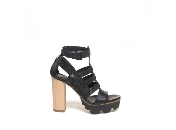 Caged sandal with wooden heel