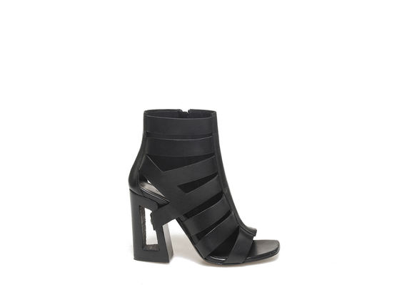 Peep-toe asymmetrical low boot on perforated heel - Black