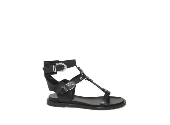 Sandal with studs and buckles