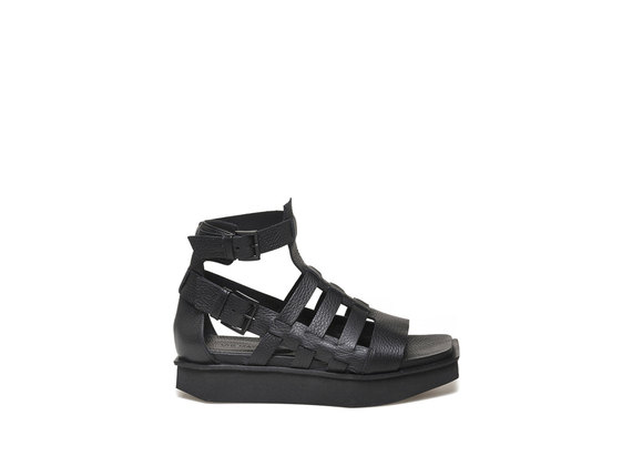 Caged sandal with micro flatform