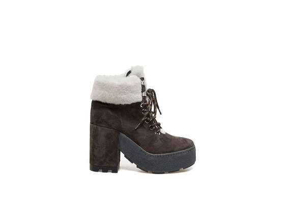 Brown suede lace-up booties with sheepskin