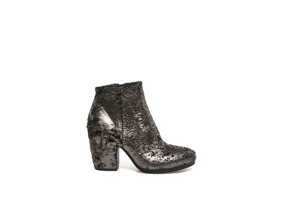 Metallic bronze-coloured carved leather ankle boots