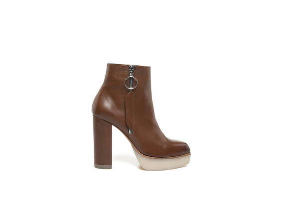 Black leather and brown leather ankle boots with side zip