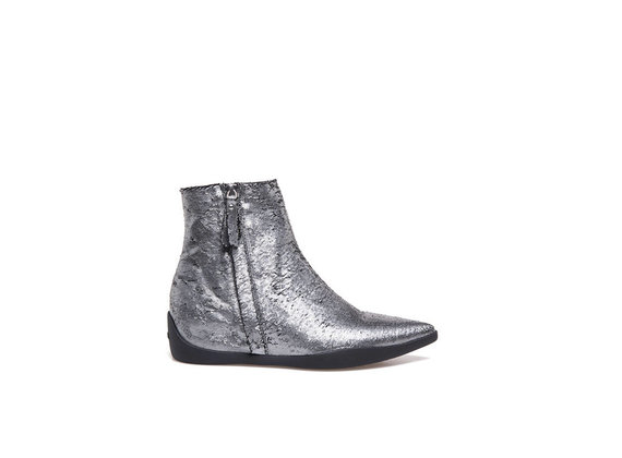 Carved metallic leather ankle boots with rubber bottom