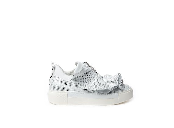 Perforated leather slip-on with white ruffles