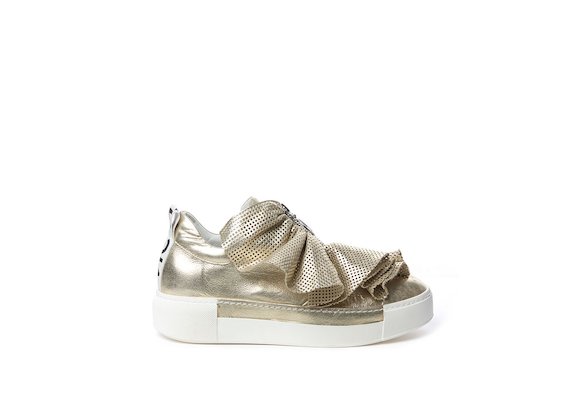 Platinum laminated leather slip-on with perforated ruffles