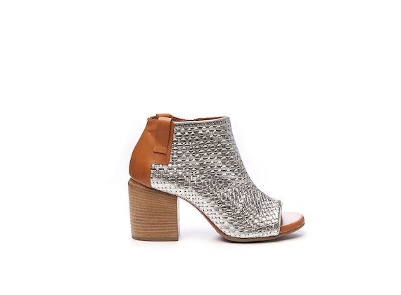 Peep-toe half boot in silver braided leather