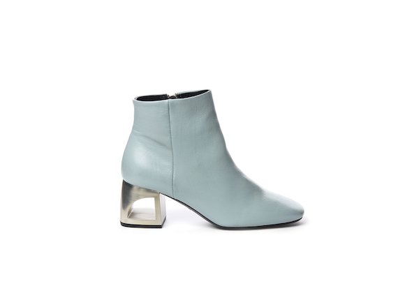 Powder blue leather half boot with hole heel