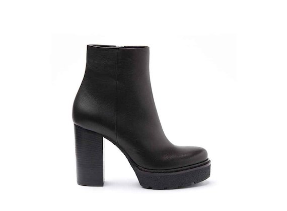 Black leather heeled ankle boots with crepe platform and leather-covered heel