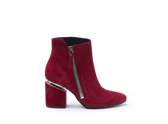 Red suede heeled ankle boots with maxi zip and suspended heel