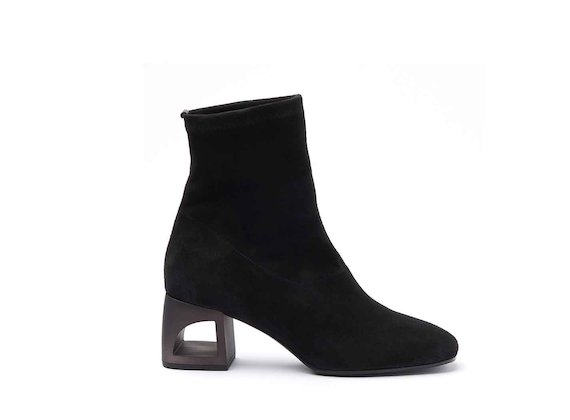 Black stretch suede heeled ankle boots with perforated heel