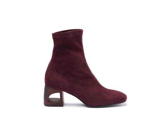 Burgundy stretch suede heeled ankle boots with perforated heel