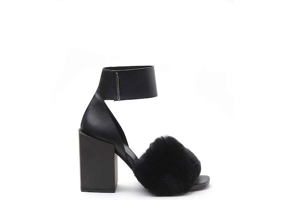 Sandals with fur band and ankle strap with high black block heel