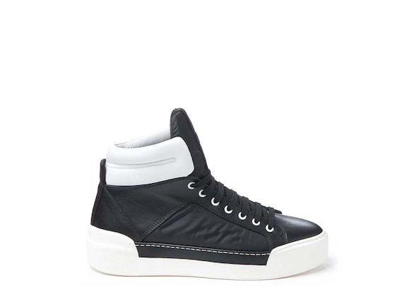 Sneakers noires avec col rembourré en contraste - Noir / Blanc