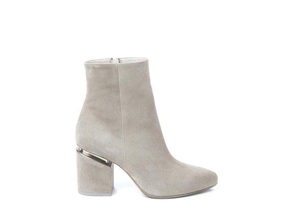 Beige ankle boot with suspended heel