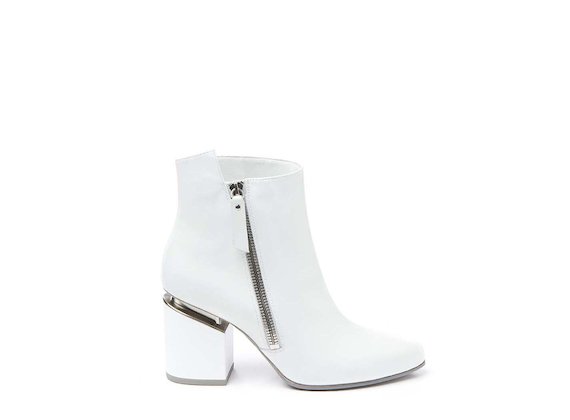 White ankle boot with side zip and suspended heel