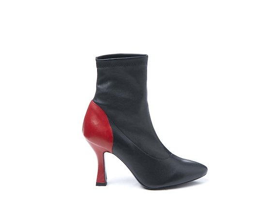 Black stretch heeled ankle boot with contrasting red heel
