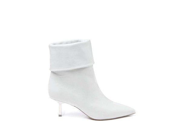 White fold-over half boot with metallic heel