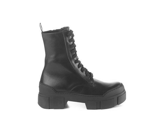 Black calfskin combat boots with lugged sole