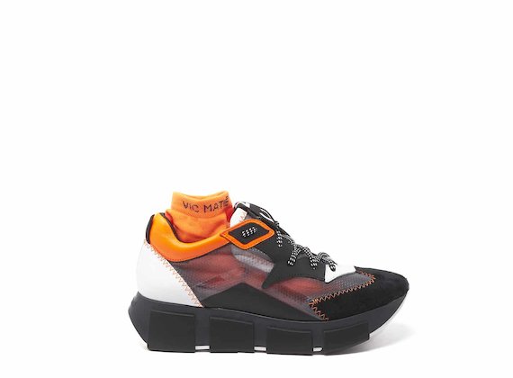 Black/orange running shoes with see-through upper