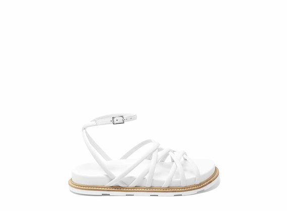 White sandals with criss-crossing strips