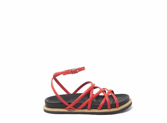 Red sandals with criss-crossing strips