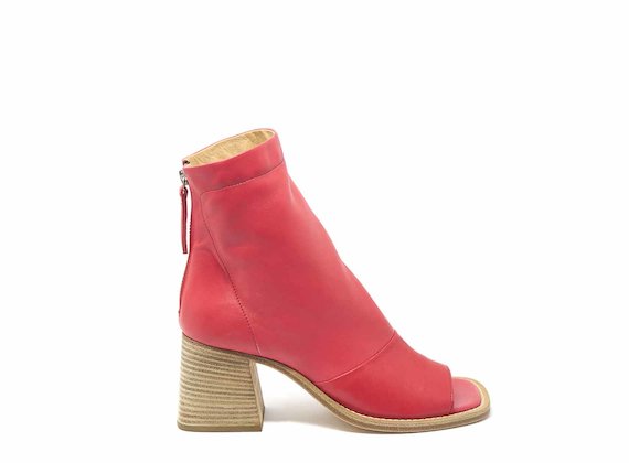 Raised red ankle boots