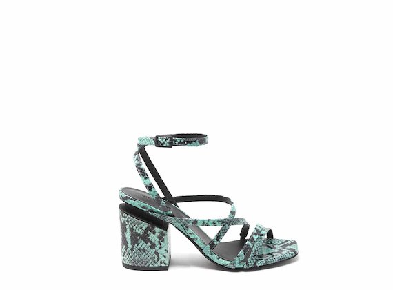 Snakeskin-effect sandals with criss-crossing strips and suspended heels